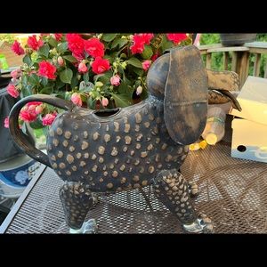 Dog shaped watering can metal. bug eyes, tail is “handle”long floppy ears